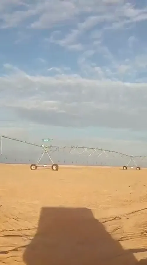 A complete AksuPivot machine standing on bare desert sand in Egypt