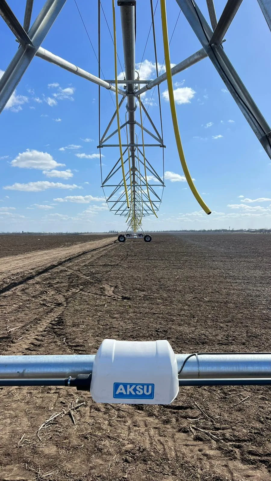 Looking up through the pivot point A-frame at the top elbow, with an AksuPivot pipe collar in front