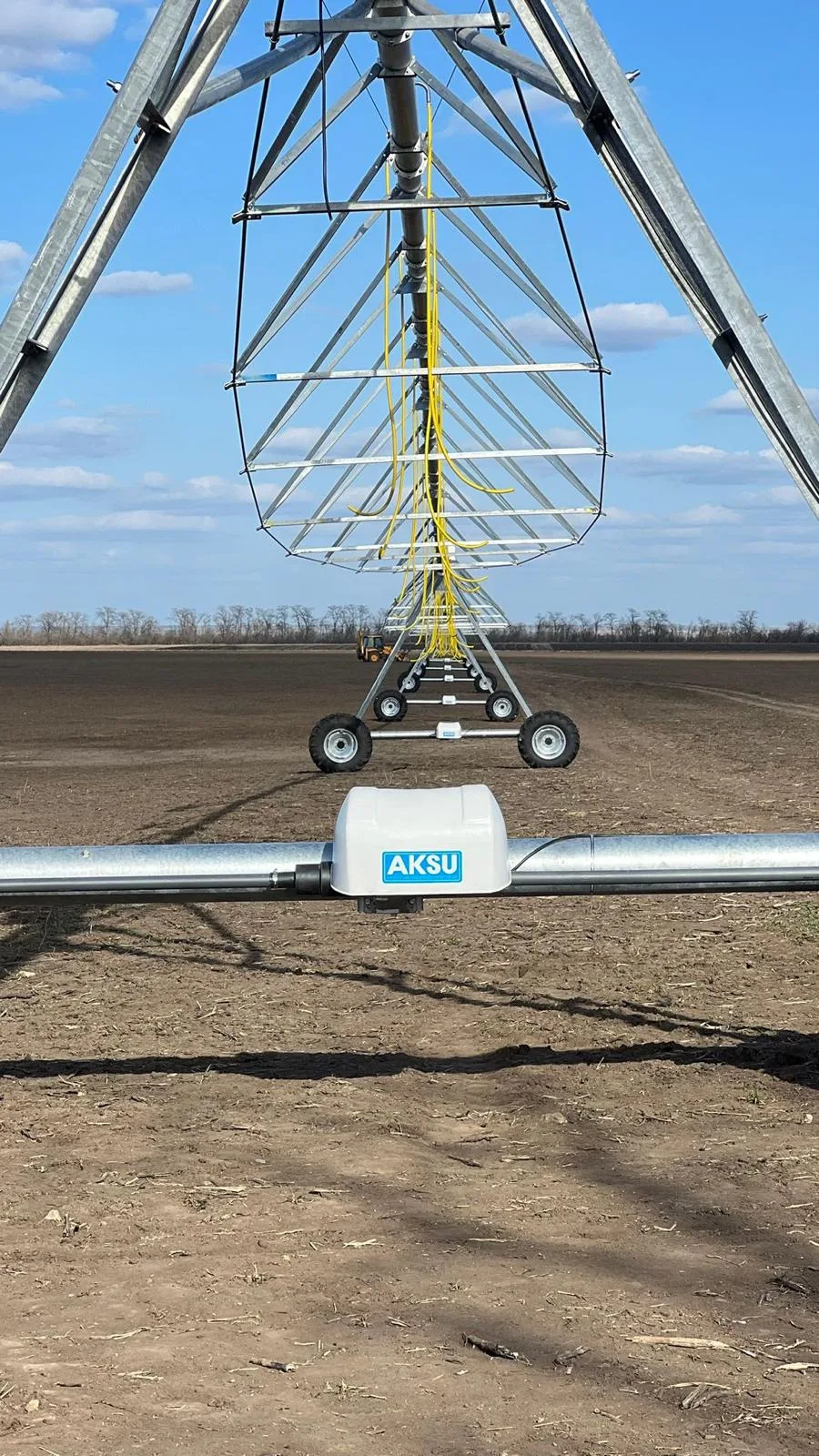 Looking out along the span from under the pivot point, with an AksuPivot pipe collar in front